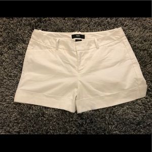 Woman’s white shorts.